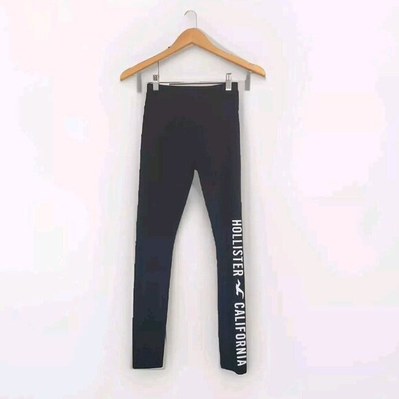 Hollister Pants - Hollister Mid Rise Leggings Women's Size XS Black With White Call Out On Leg